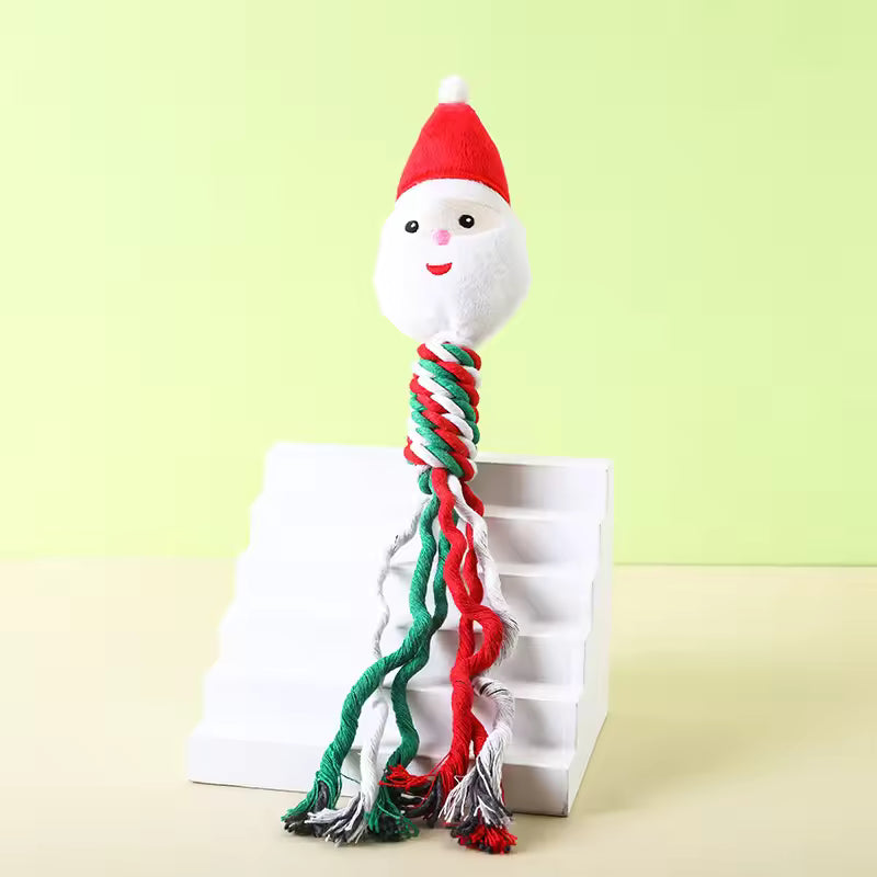 Durable Christmas dog rope toy featuring a plush Santa Claus head and a braided red, white, and green cotton rope handle.