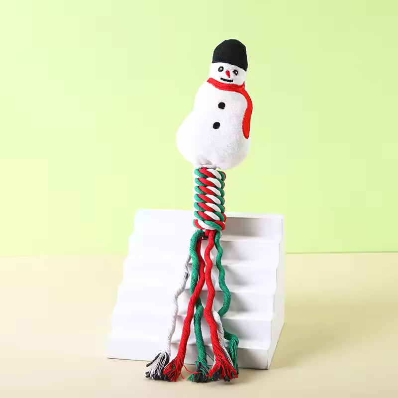 Durable Christmas dog rope toy featuring a plush snowman head with a black top hat and a braided red, white, and green cotton rope handle.