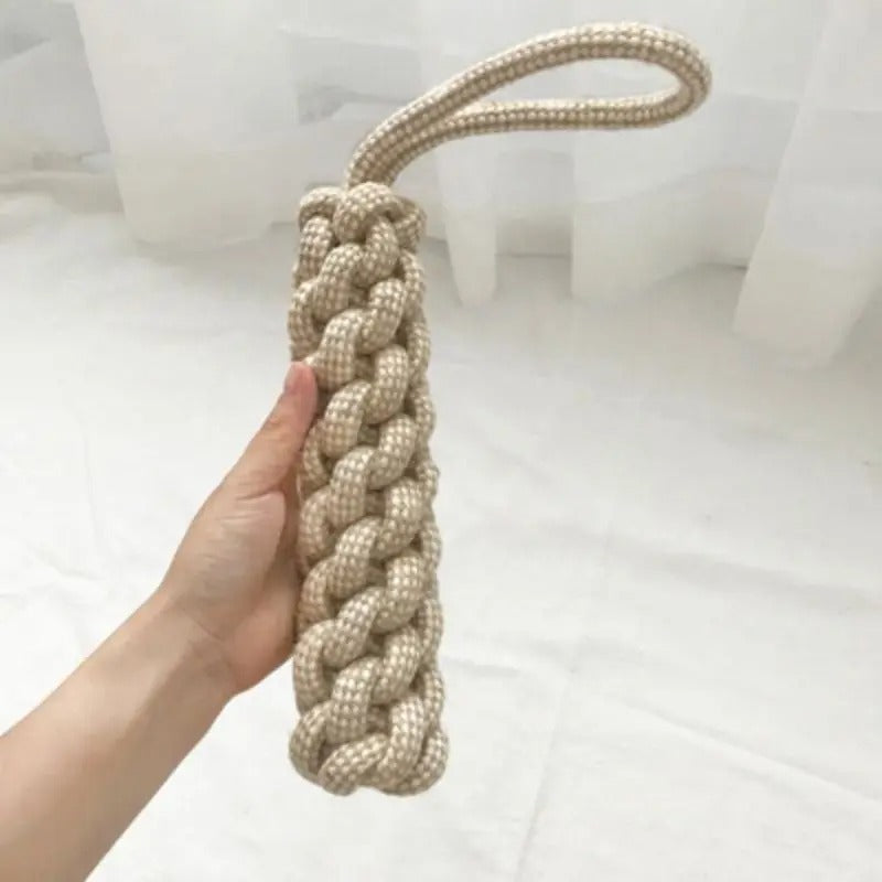 Wear-resistant rope knot chew toy for interactive play and cleaning dog and cat teeth.