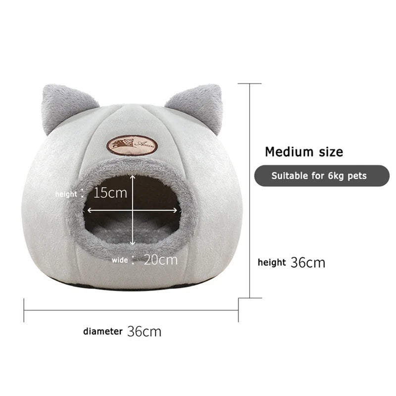 Image showing the removable inner cushion and the cozy, enclosed interior of the cat bed.