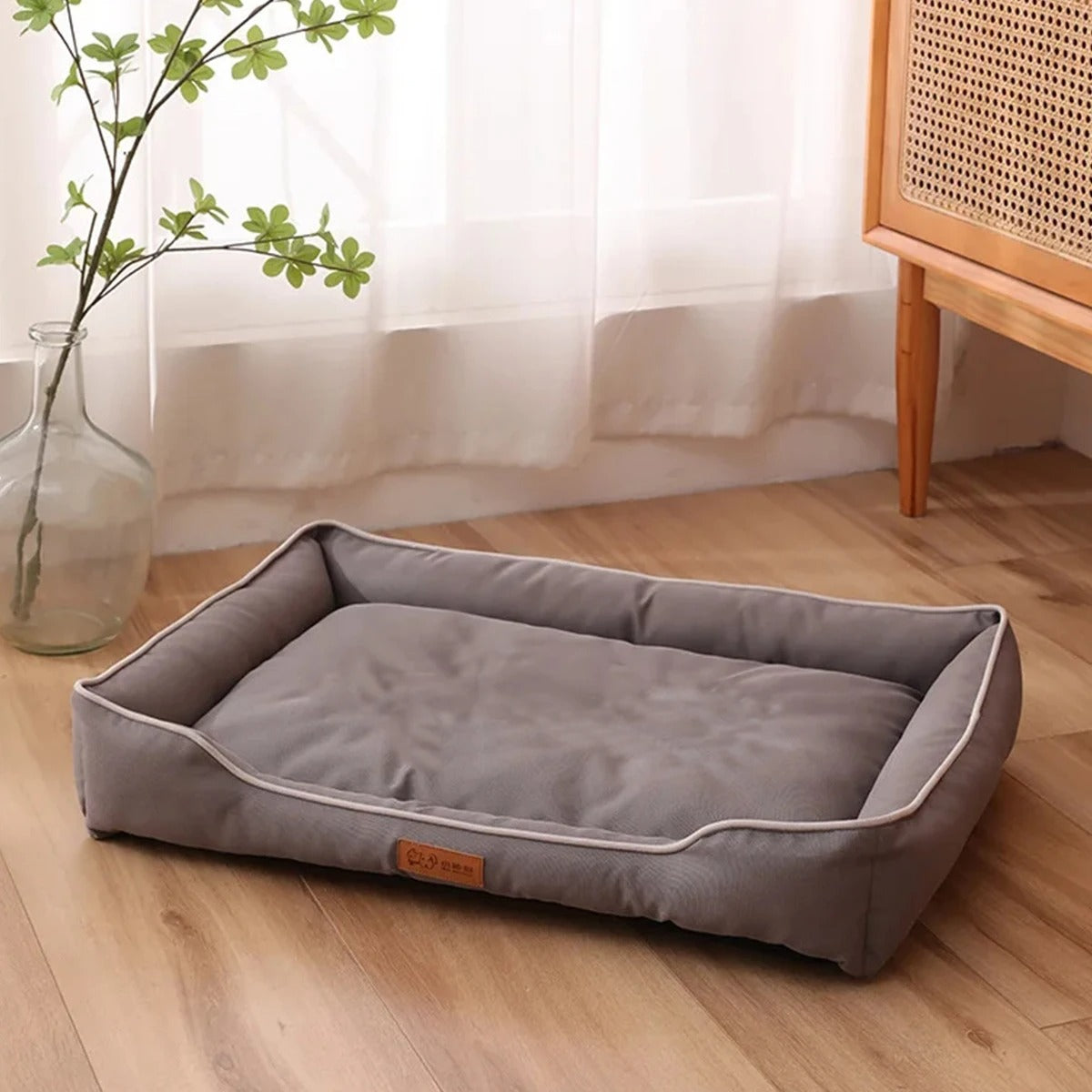 Close-up of the bite-resistant fabric and soft, thickened cushion inside the large pet bed.